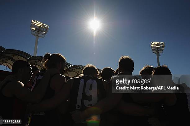 Players of the Saints huddle before the round 15 AFL match between the Gold Coast Suns and the St Kilda Saints at Metricon Stadium on July 2, 2016 in...