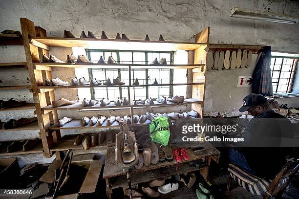 John Gertse at the shoes factory on September 17, 2014 in Clanwilliam. Heuningvlei is a small village situated in the heart of the Cederberg...