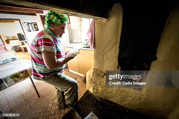 Ounooi Ockhuis bakes in her kitchen on September 17, 2014 in Clanwilliam. Heuningvlei is a small village situated in the heart of the Cederberg...