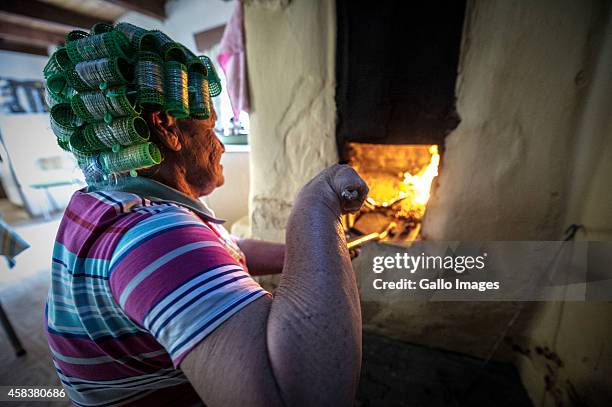 Ounooi Ockhuis bakes in her kitchen on September 17, 2014 in Clanwilliam. Heuningvlei is a small village situated in the heart of the Cederberg...