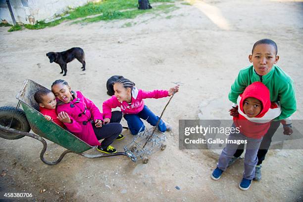 Children playing on September 17, 2014 in Clanwilliam. Heuningvlei is a small village situated in the heart of the Cederberg Mountains. It was...