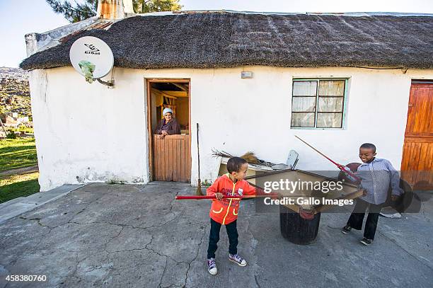 Children playing on September 17, 2014 in Clanwilliam. Heuningvlei is a small village situated in the heart of the Cederberg Mountains. It was...