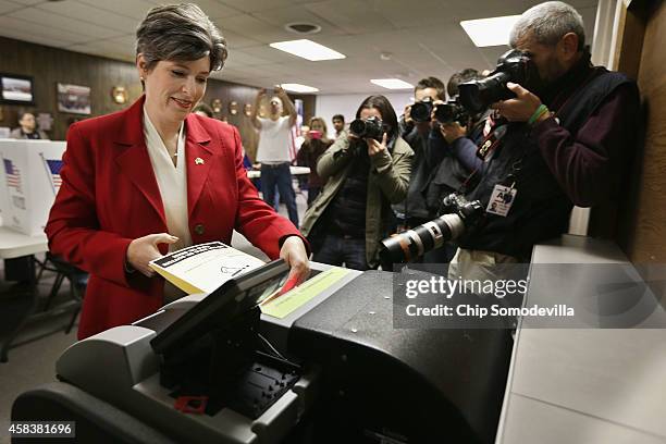 Republican U.S. Senate candidate Joni Ernst casts her ballot on election day at the polling place in her hometown fire department November 4, 2014 in...