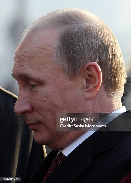 Russian President Vladimir Putin attends a ceremony honouring the National Unity Day on Red Square on November 4, 2014 in Moscow, Russia. A national...