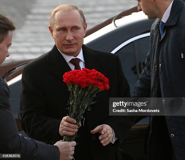 Russian President Vladimir Putin attends a ceremony honouring the National Unity Day on Red Square on November 4, 2014 in Moscow, Russia. A national...