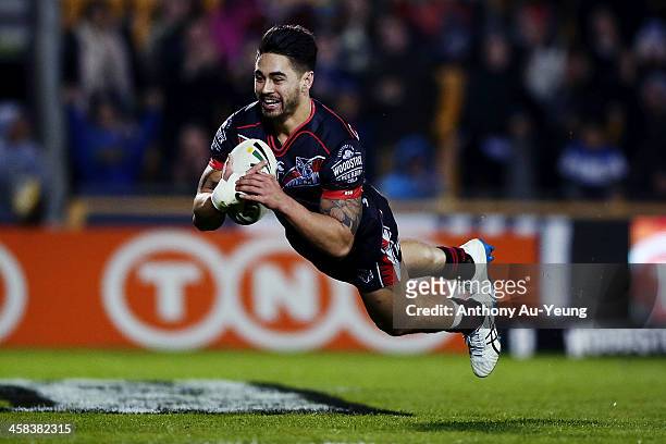 Shaun Johnson of the Warriors scores a try during the round 17 NRL match between the New Zealand Warriors and the Gold Coast Titans at Mt Smart...