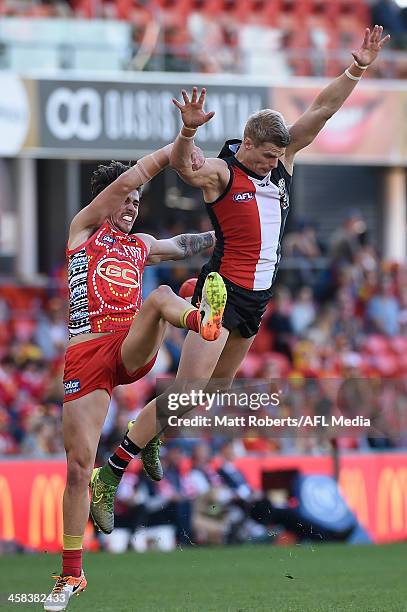 Nick Riewoldt of the Saints competes for the ball against Matt Rosa of the Suns during the round 15 AFL match between the Gold Coast Suns and the St...