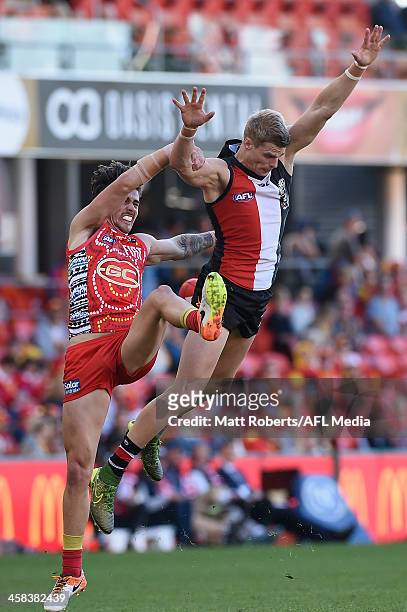 Nick Riewoldt of the Saints competes for the ball against Matt Rosa of the Suns during the round 15 AFL match between the Gold Coast Suns and the St...
