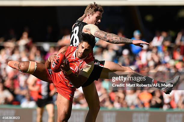 Aaron Hall of the Suns marks during the round 15 AFL match between the Gold Coast Suns and the St Kilda Saints at Metricon Stadium on July 2, 2016 in...