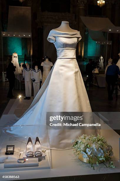 The wedding dress of Princess Victoria of Sweden designed by PÃ¤r Engsheden is seen on display during an exhibition at the Royal Palace on October...