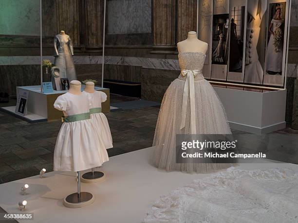 Dresses from the wedding of Princess Madeleine of Sweden are seen on display during an exhibition at the Royal Palace on October 17, 2016 in...