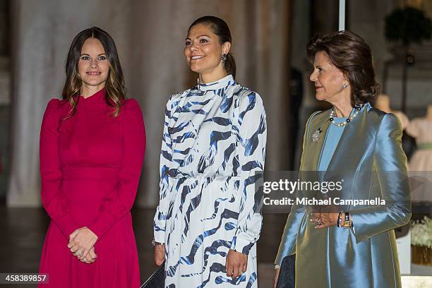 Princess Sofia, Crown Princess Victoria, and Queen Silvia of Sweden attend an exhibition of royal wedding dresses at the Royal Palace on October 17,...