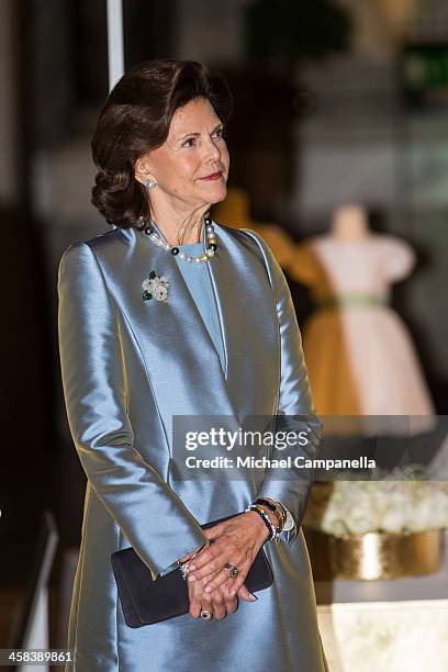 Queen Silvia of Sweden attend an exhibition of royal wedding dresses at the Royal Palace on October 17, 2016 in Stockholm, Sweden.