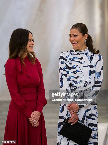 Princess Sofia and Crown Princess Victoria of Sweden attend an exhibition of royal wedding dresses at the Royal Palace on October 17, 2016 in...