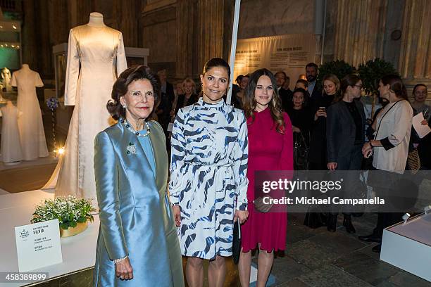 Queen Silvia, Crown Princess Victoria, and Princess Sofia of Sweden attend an exhibition of royal wedding dresses at the Royal Palace on October 17,...