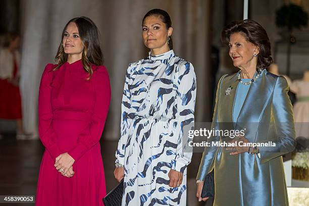 Princess Sofia, Crown Princess Victoria, and Queen Silvia of Sweden attend an exhibition of royal wedding dresses at the Royal Palace on October 17,...