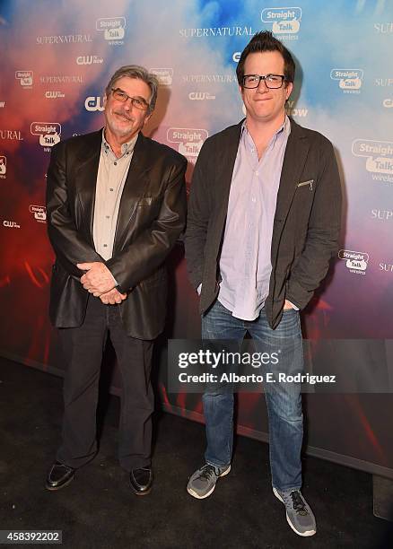 Executive producer Robert Singer and executive producer/writer Jeremy Carver attend the CW's Fan Party to Celebrate the 200th episode of...