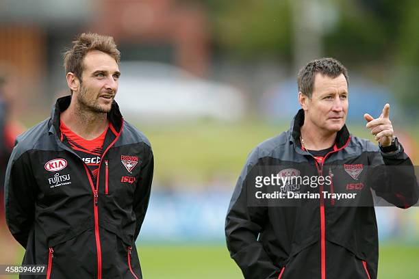 Jobe Watson and John Worsfold, Senior Coach of the Bombers look on during an Essendon Bombers AFL pre-season training session at True Value Solar...