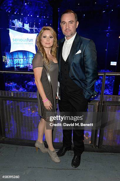 Nick Ede and guest attends the second annual SeriousFun Network Gala at at The Roundhouse on November 4, 2014 in London, England.