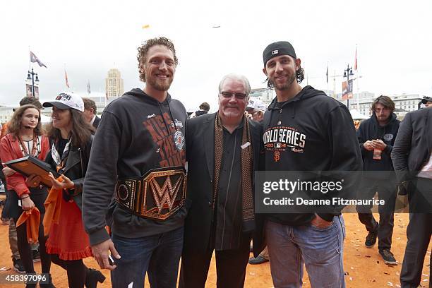 World Series Championship Parade: View of San Francisco Giants Madison Bumgarner and Hunter Pence victorious with general manager Brian Sabean during...