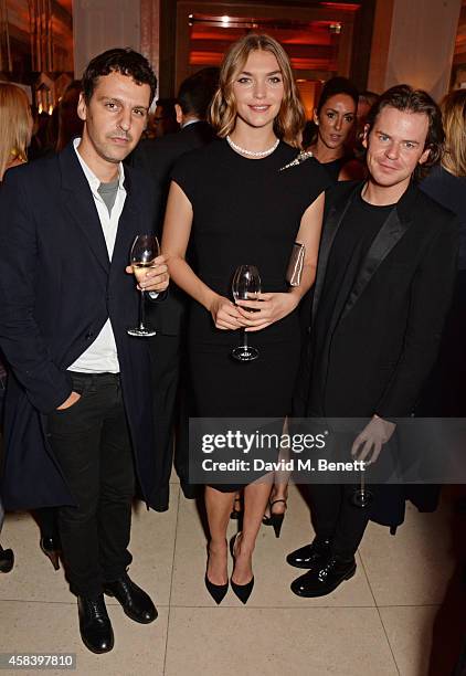 Marios Schwab, Arizona Muse and Christopher Kane attend the Harper's Bazaar Women Of The Year awards 2014 at Claridge's Hotel on November 4, 2014 in...