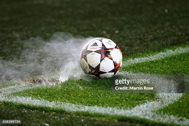Fireworks are thrown onto the pitch by the Galatasaray fans during the UEFA Champions League Group D match between Borussia Dortmund and Galatasaray...