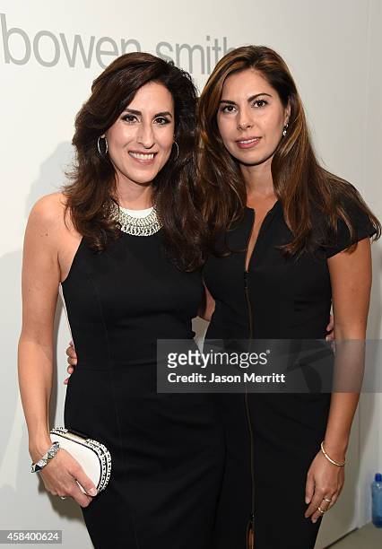 Ritsa Panagis and Steffie Rogotis attend the Brian Bowen Smith WILDLIFE show hosted by Casamigos Tequila at De Re Gallery on October 23, 2014 in West...