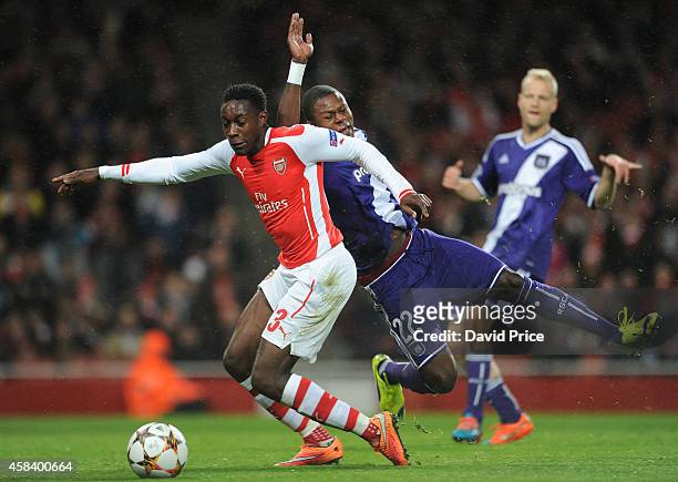 Danny Welbeck of Arsenal is fouled by Chancel Mbemba of Anderlecht to give away a penalty to Arsenal during the match between Arsenal and Anderlecht...