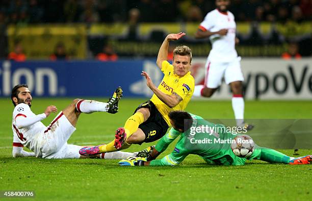 Ciro Immobile of Borussia Dortmund scores his team'sthird goal past goalkeeper Fernando Muslera of Galatasaray during the UEFA Champions League Group...