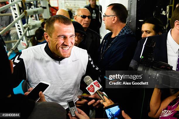 Russian boxer Sergey Kovalev speaks to the media before a workout at Gleason's Gym on November 4, 2014 in the Brooklyn borough of New York City.