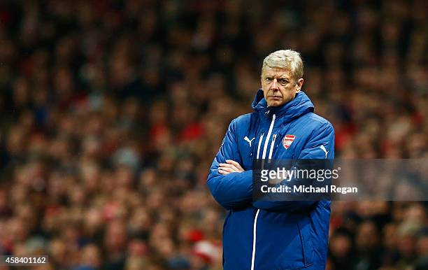 Arsene Wenger manager of Arsenal looks on during the UEFA Champions League Group D match between Arsenal FC and RSC Anderlecht at Emirates Stadium on...