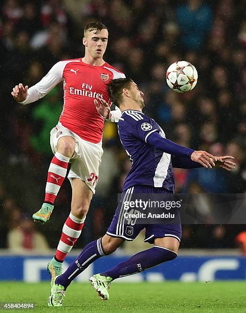 Calum Chambers of Arsenal and Aleksander Mitrovic of Anderlecht in action during the UEFA Champions League Group D football match between Arsenal and...