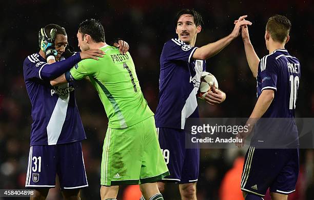 Youri Tielemans , Silvio Proto , Sacha Kljestan and Dennis Praet of Anderlecht celebrate after scoring during the UEFA Champions League Group D...