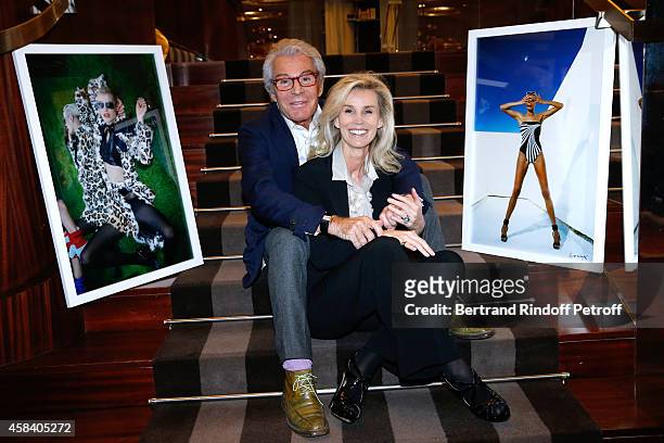 Jean-Daniel Lorieux and his companion Laura Restelli attend Jean-Daniel Lorieux signs his Book 'Sunstroke' at the Art Bookshop of the 'Royal Monceau...