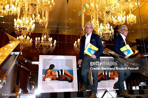 Jean-Daniel Lorieux signs his Book 'Sunstroke' at the Art Bookshop of the 'Royal Monceau - Raffles Paris' on November 4, 2014 in Paris, France.
