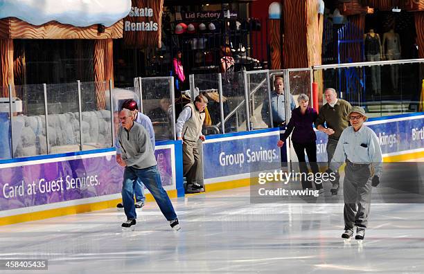 seniors skating ... west edmonton mall - west-mall-rink stock pictures, royalty-free photos & images