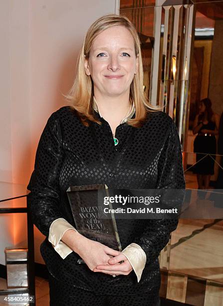 Sarah Burton, winner of the Designer of the Year award, poses at the Harper's Bazaar Women Of The Year awards 2014 at Claridge's Hotel on November 4,...