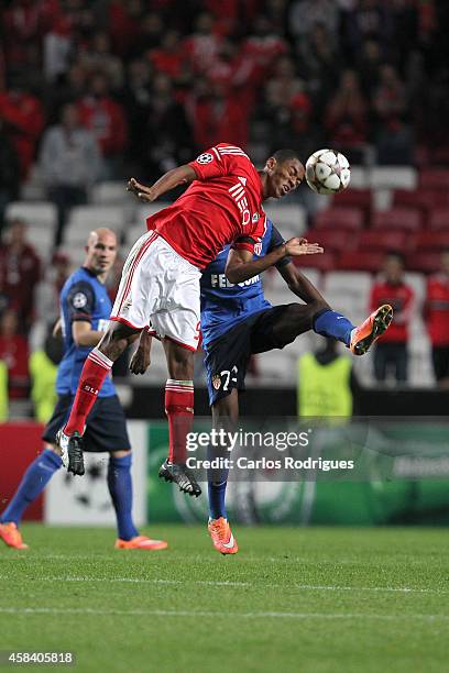 Benfica's forward Derley vies Monaco's midfielder Geoffrey Kondogbia during the UEFA Champions League match between SL Benfica and AS Monaco at the...