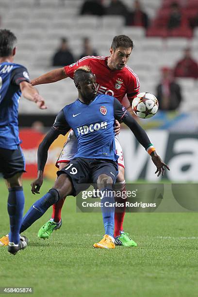 Monaco's forward Lacina Traore vies with Benfica's defender Jardel Vieira during the UEFA Champions League match between SL Benfica and AS Monaco at...