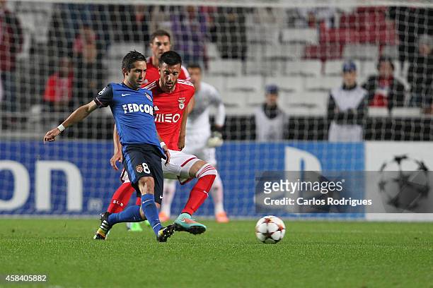 Monaco's midfielder Joao Moutinho vies with Benfica's midfielder Andreas Samaris during the UEFA Champions League match between SL Benfica and AS...