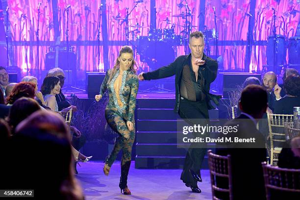 Ola Jordan and James Jordan on stage during the second annual SeriousFun Network Gala at at The Roundhouse on November 4, 2014 in London, England.