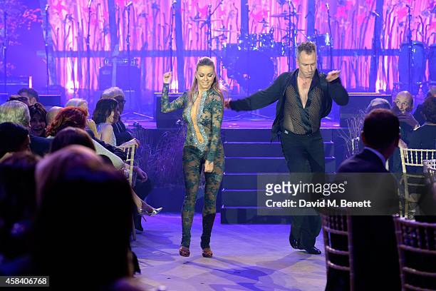 Ola Jordan and James Jordan on stage during the second annual SeriousFun Network Gala at at The Roundhouse on November 4, 2014 in London, England.
