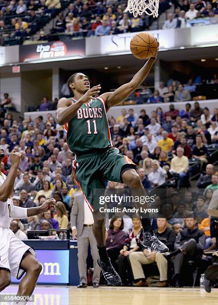 Brandon Knight of the Milwaukee Bucks shoots the ball during the game against the Indiana Pacers at Bankers Life Fieldhouse on November 4, 2014 in...