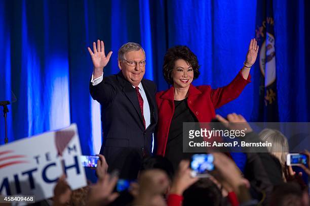 Sen. Mitch McConnell celebrates with his wife Elaine Chao at his election night event November 4, 2014 in Louisville, Kentucky. McConnell defeated...