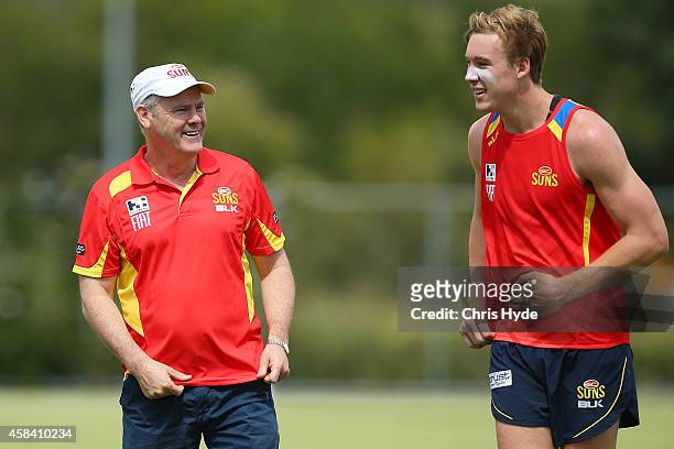 Coach Rodney Eade and Tom Lynch talk during a Gold Coast Suns training session at Metricon Stadium on November 5, 2014 in Gold Coast, Australia.