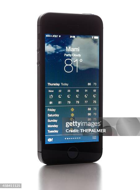 apple iphone 5s - weather app stock pictures, royalty-free photos & images