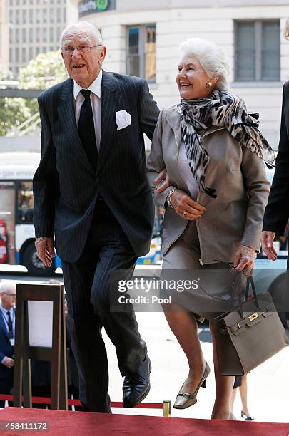 Former Australian Prime Minister Malcolm Fraser arrives with his wife Tamie at the state memorial service for former Australian Prime Minister Gough...