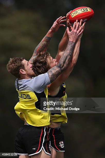 Saints newest recruit Tim Membrey competes for the ball against Daniel Markworth during a St.Kilda Saints AFL media session at Linen House Oval on...