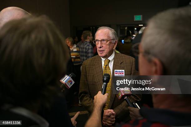 Former Georgia Sen. Sam Nunn talks to reporters about his daughter, Georgia Democratic U.S. Senate candidate Michelle Nunn, during an election party...