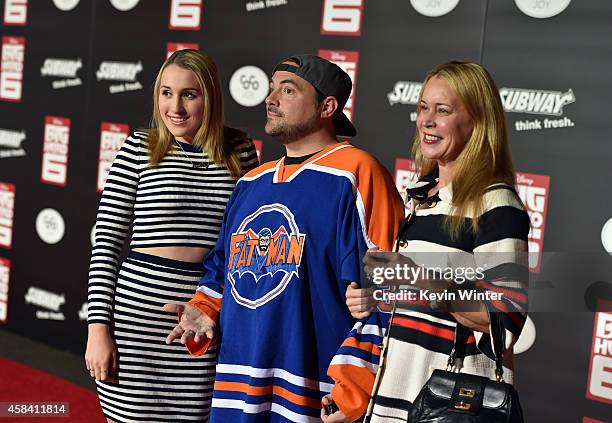 Harley Quinn Smith, director Kevin Smith and actress Jennifer Schwalbach Smith attend the premiere of Disney's "Big Hero 6" at the El Capitan Theatre...